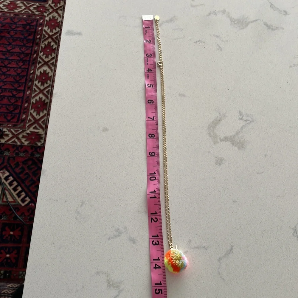 Claire’s Rainbow Unicorn PomPom Necklace